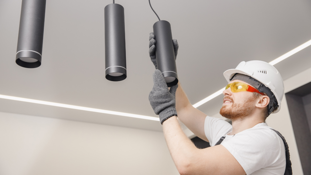 He Said No To Overtime On His Own Terms, So His Workplace Started Treating Him Differently electrical company employee installing lights