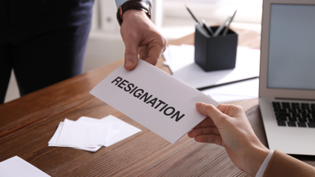 employee handing in resignation letter