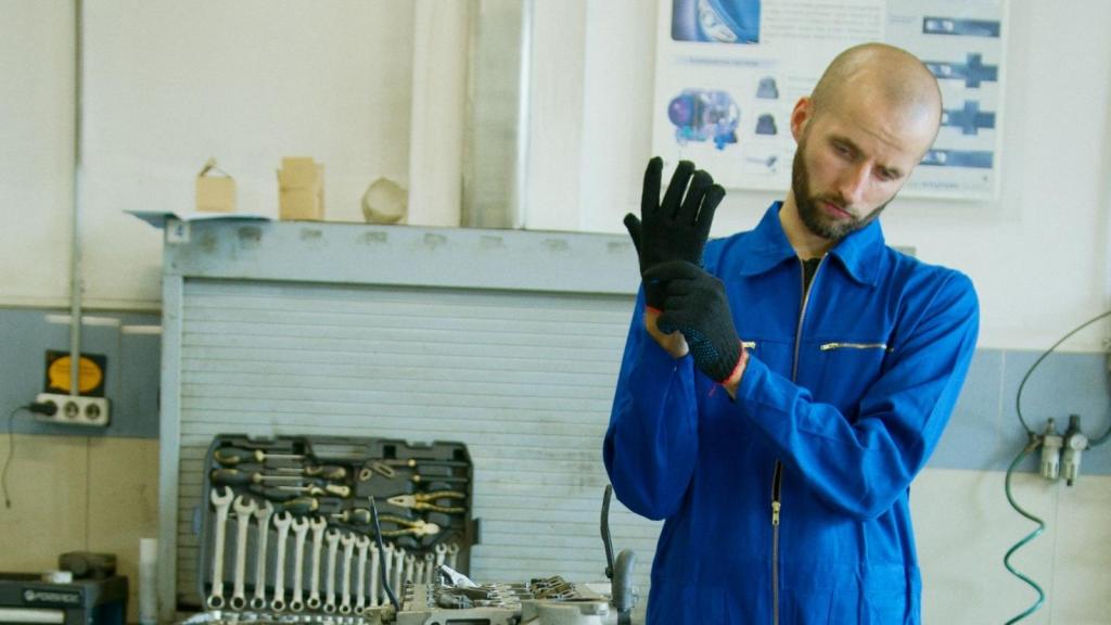 engineer in blue jumpsuit