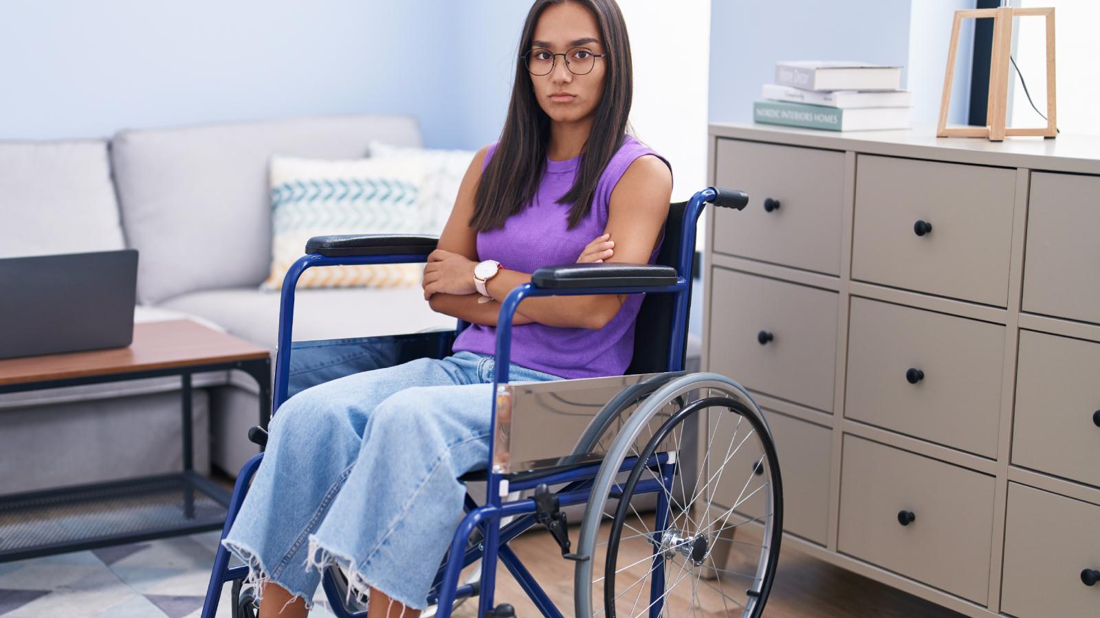 Disabled Woman Says Her Elderly Neighbors Keep Harassing Her For No Reason, And She Just Wants Them To Leave Her Alone woman in a wheelchair
