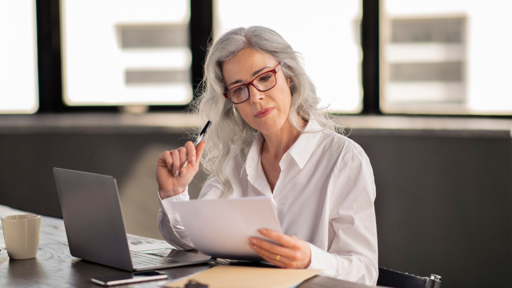 They Asked To Be Known By Their Preferred Name At Work, But After Management Ignored It, They Decided To Change Their Name Legally human resources woman in office looking at paper