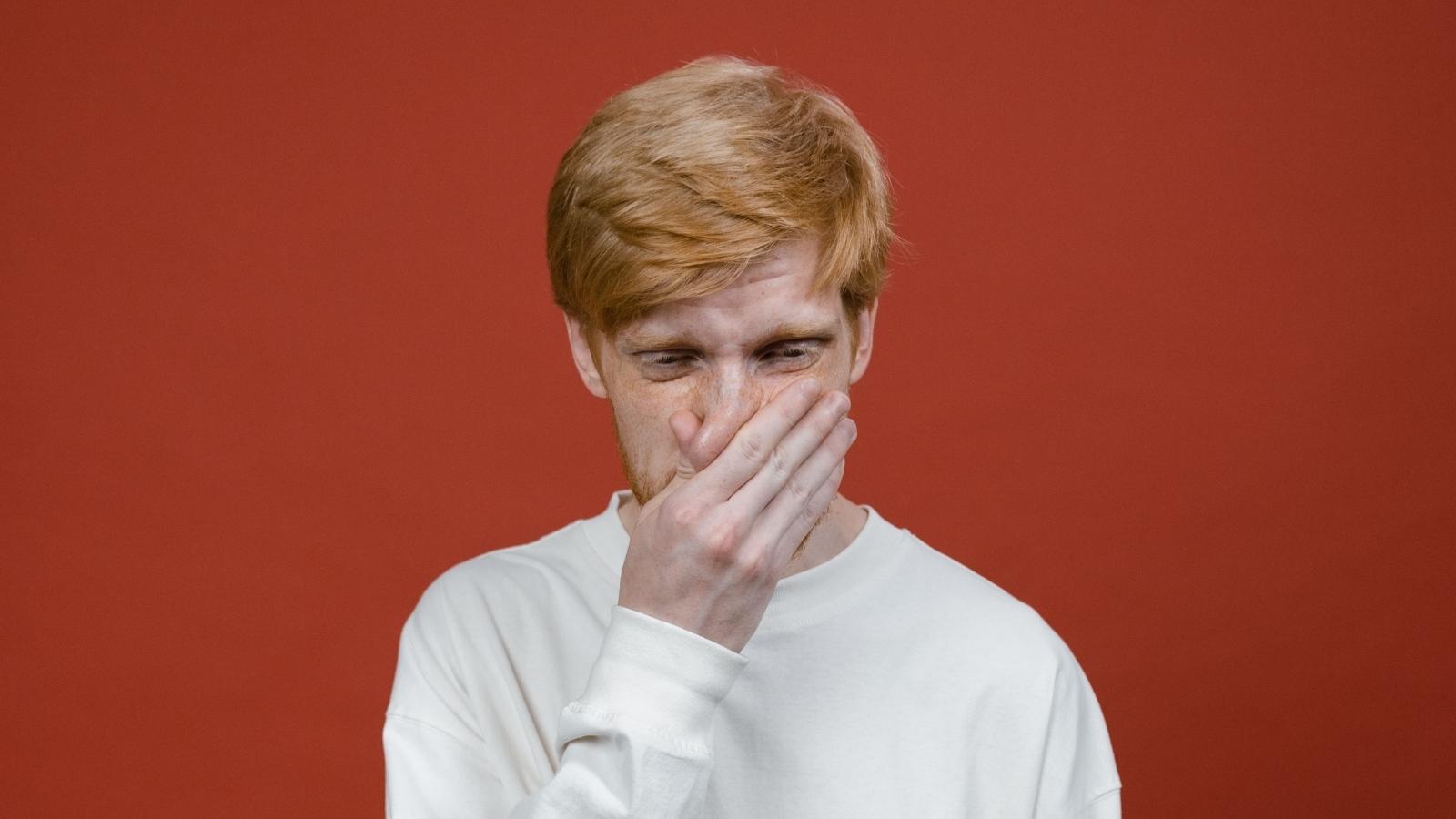 He Invented a $150 System Scrub for an Anxious Customer—Then a Live Cockroach Crawled Out of a Blank Notebook and Stole the Stores Attention man in white shirt looking disgusted