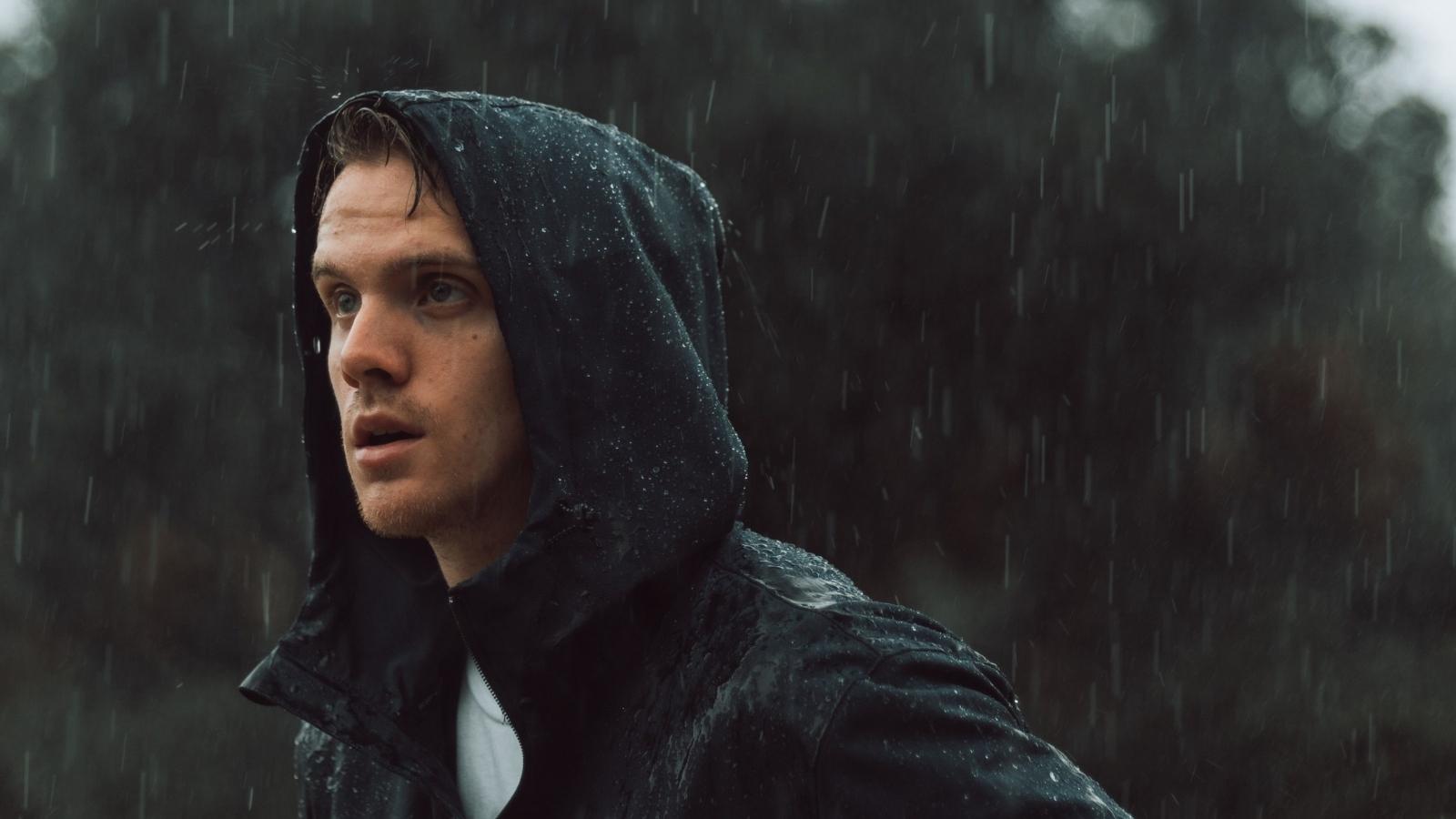 Man Lied To His Messy Roommate About Family Visiting, Then Locked Him Out On A Rainy Night man standing in the rain
