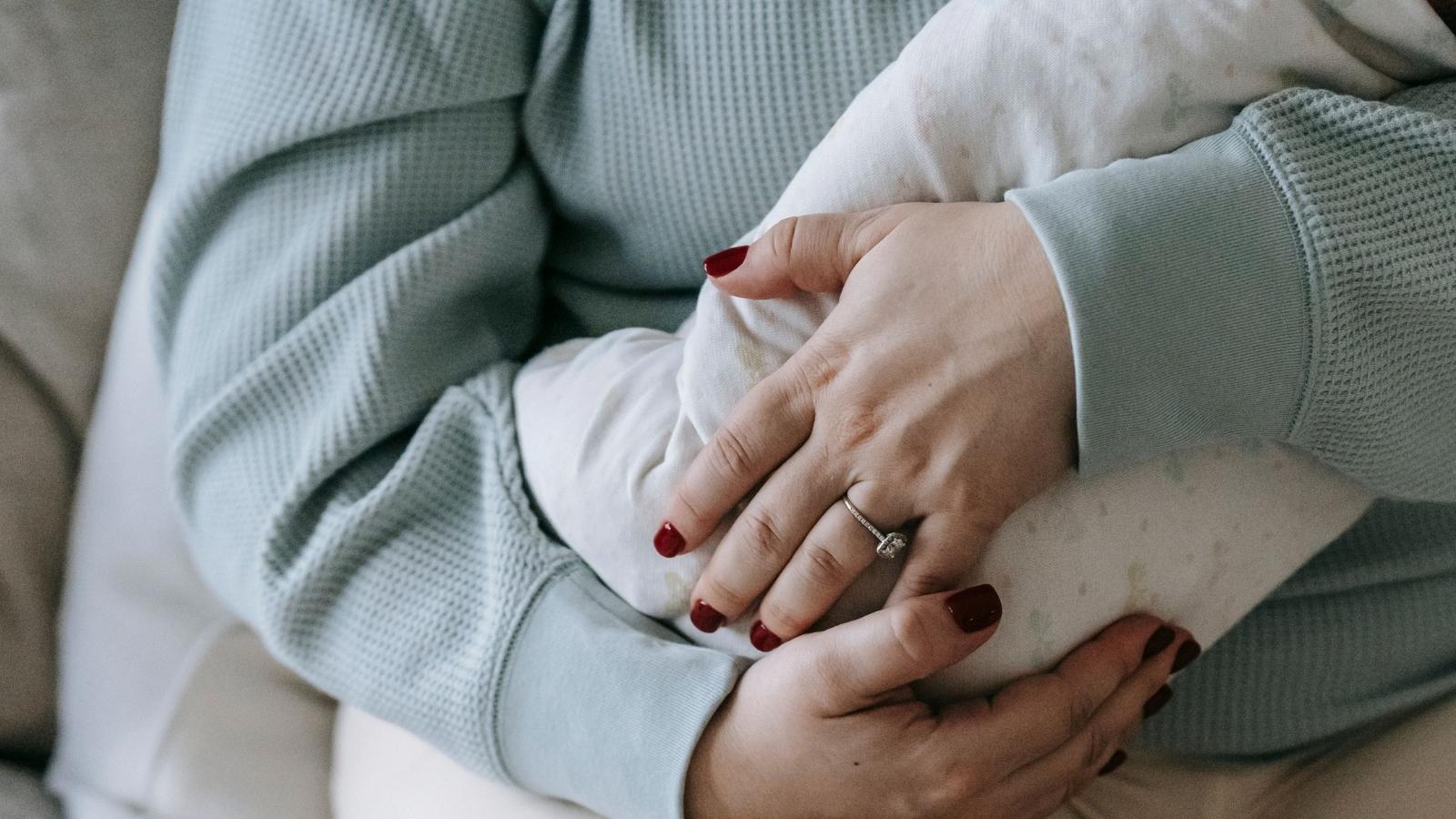 new mom holding baby