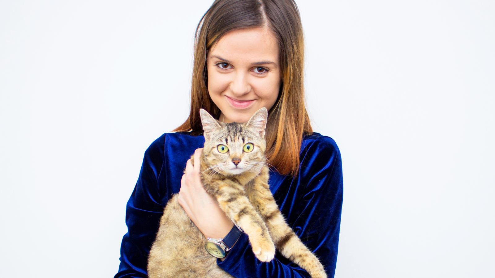 woman holding a cat