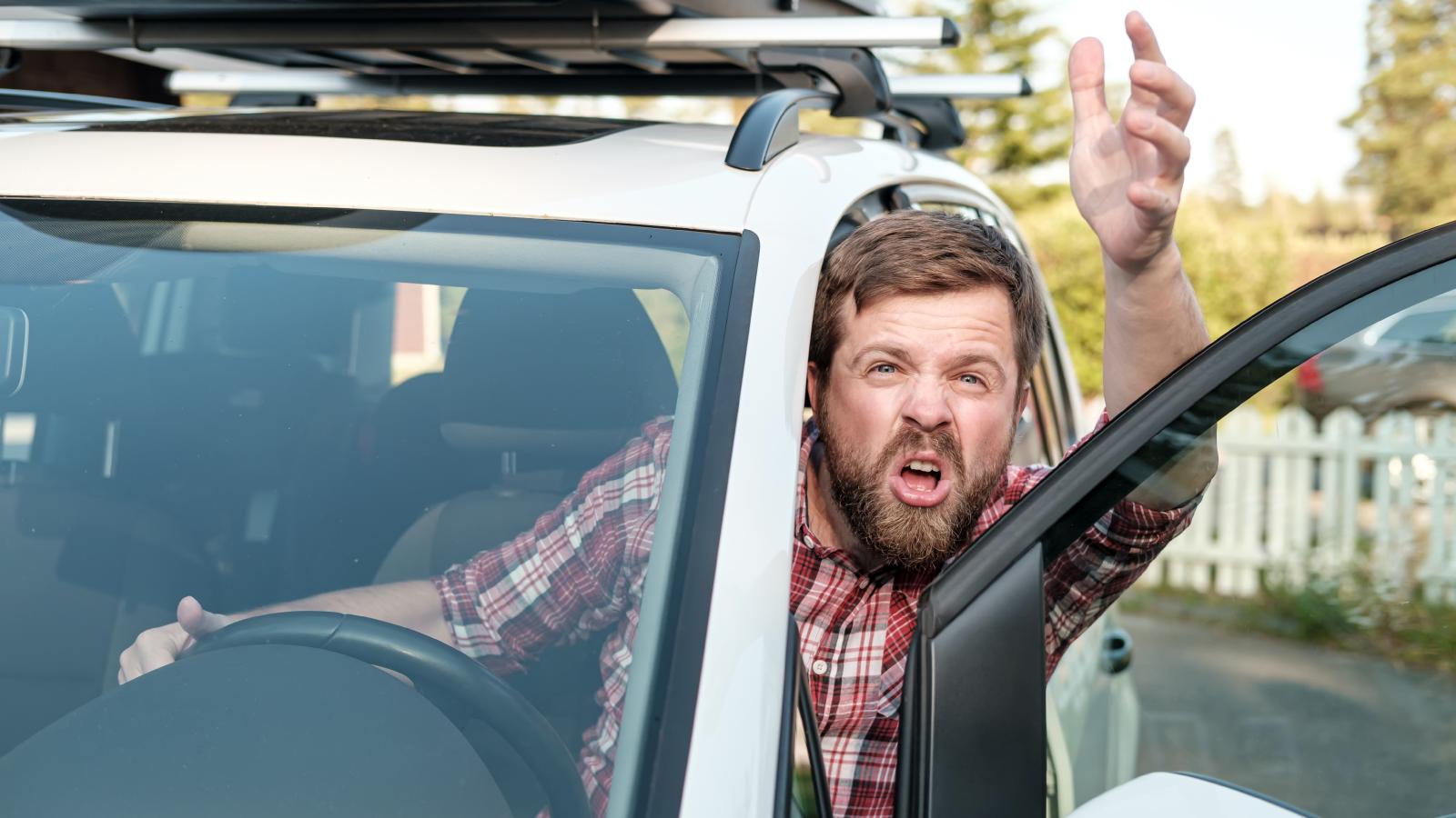 Rude Condo Renter Didn’t Know He Was Yelling at the Owner—Then His Behavior Led to His Arrest man yelling from a car