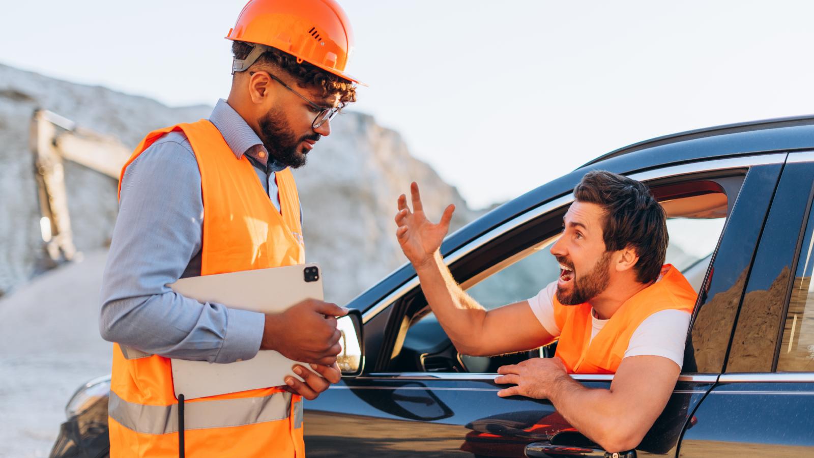 man arguing with a construction worker