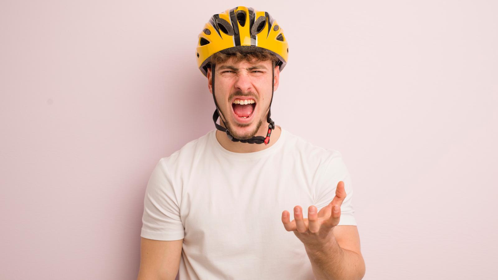 A Rude Cyclist Accused Him Of Trying To Steal His Bike — Right There On The Street man wearing a bike helmet