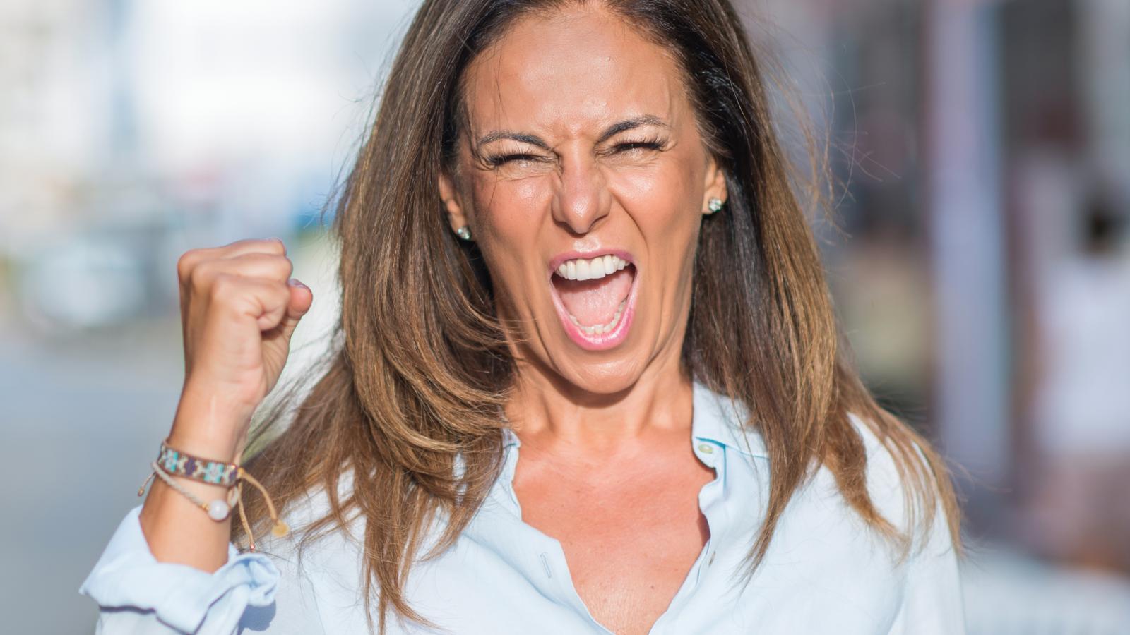 She Spent Months Getting Verbal Abuse Every Time She Stepped Out Her Front Door—Then Handed the Police a 30 Day Video Dossier that Secured an Immediate Restraining Order woman yelling in the street