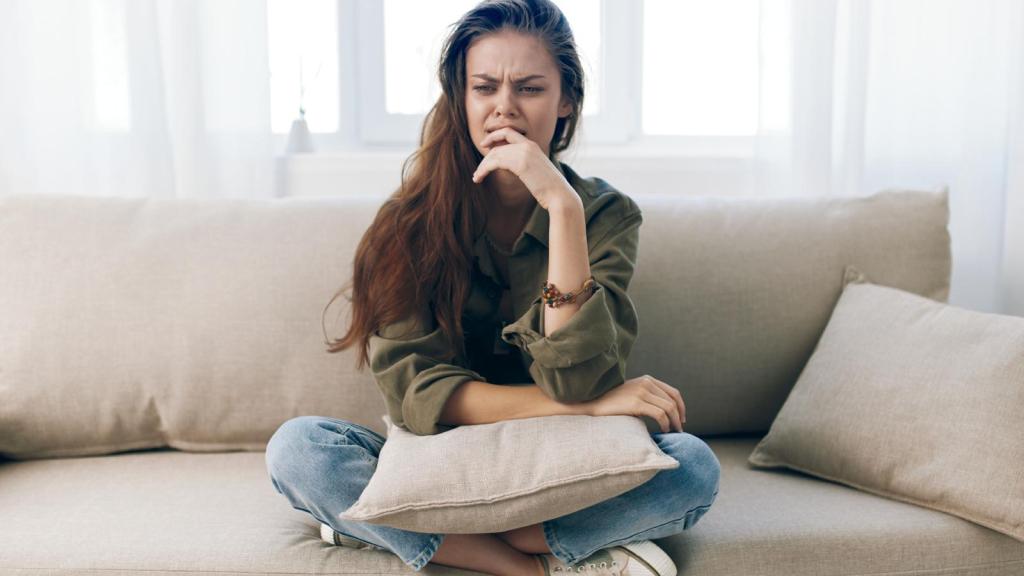woman sitting on a couch