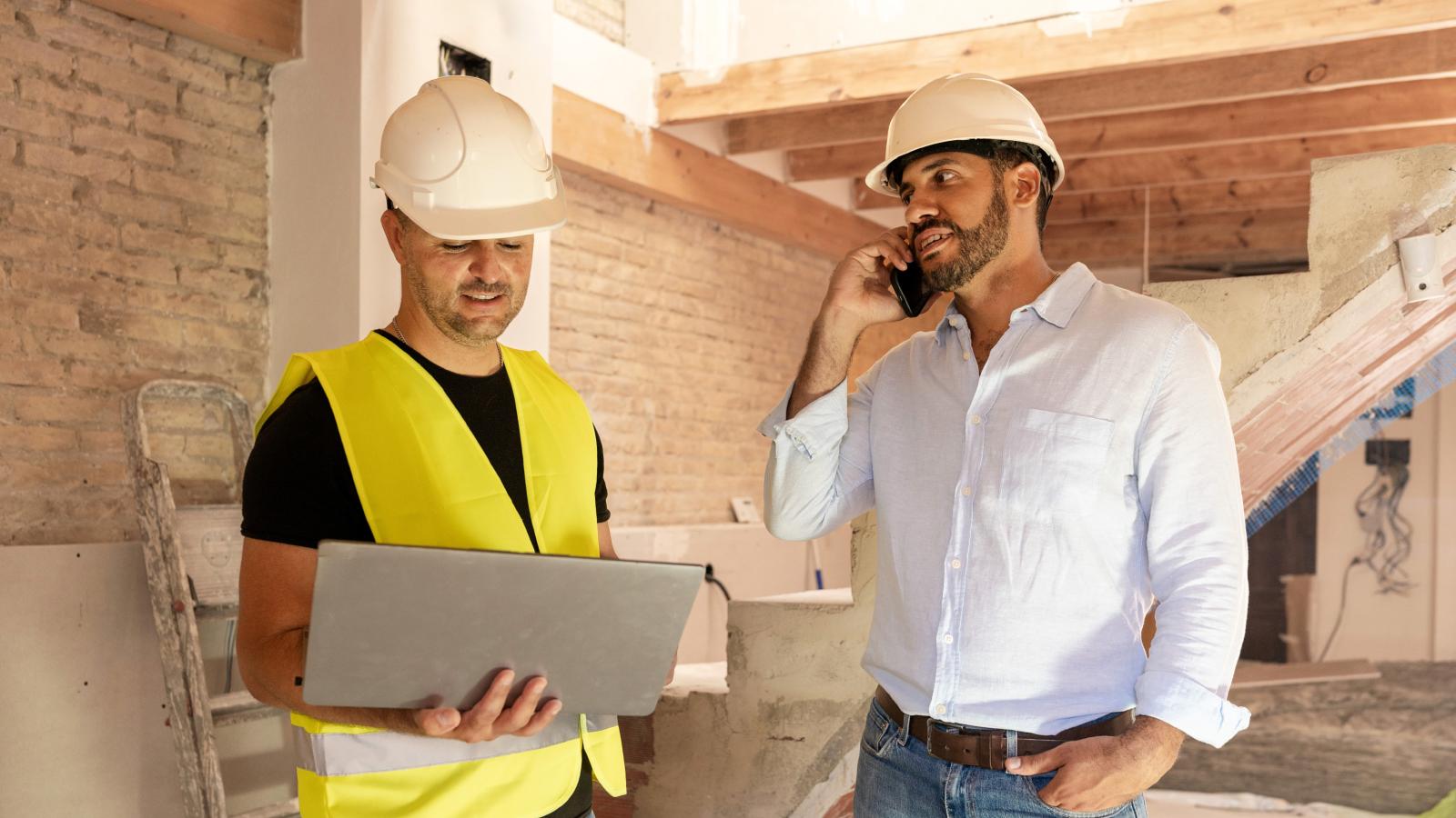 Homeowner Discovered His Contractor Was Ripping Him Off—So He Sued and Put His Career at Risk man talking to a contractor