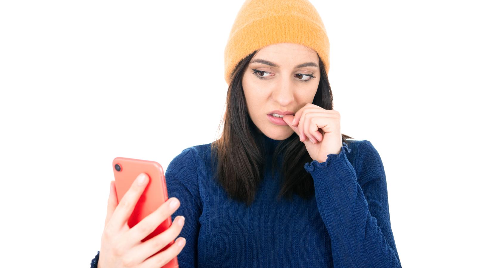 woman looking at her phone