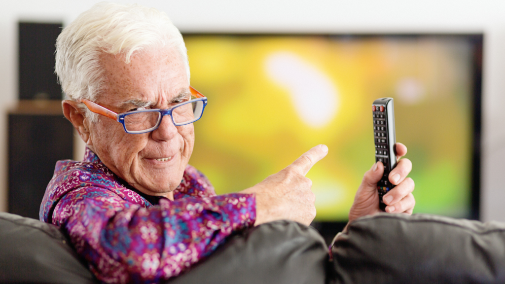 old man confused with new tv