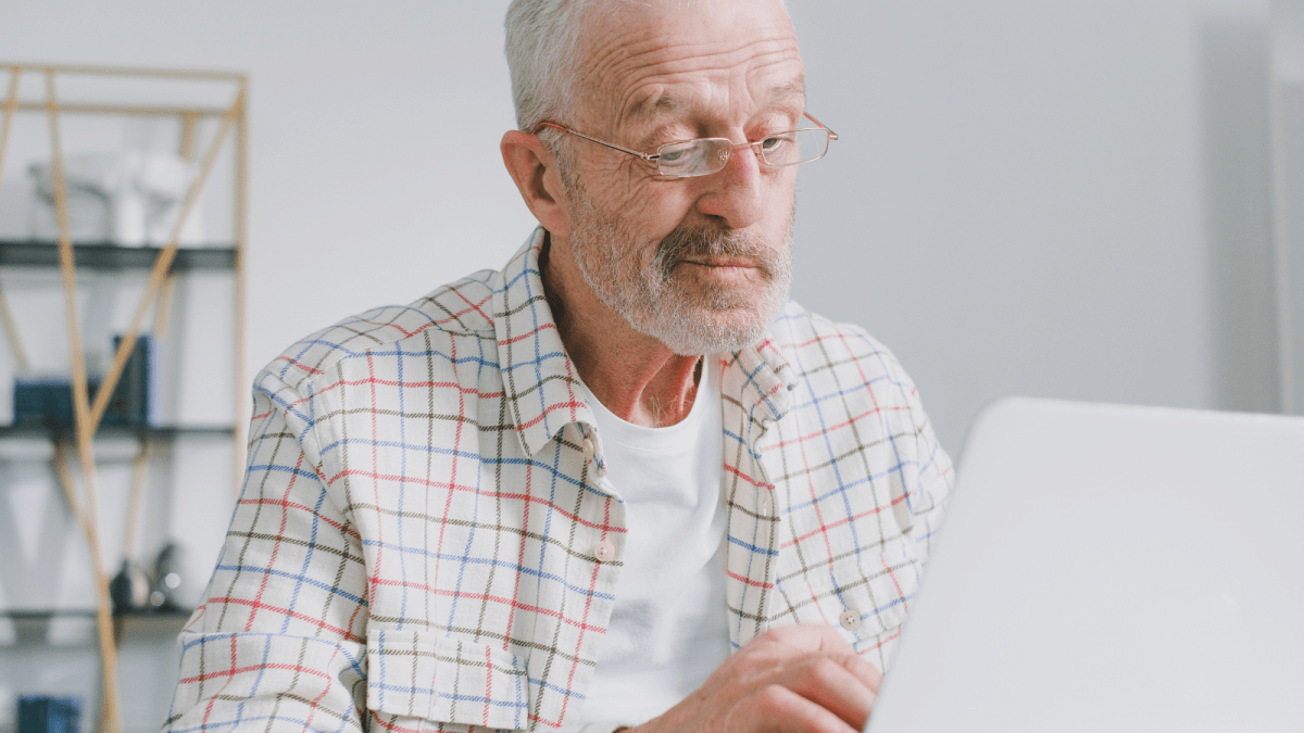 He Kept a $1 Million Policy for 15 Years as a Gift—Then Handed His Son a $450 Monthly Premium Invoice and Demanded Reimbursement older man looking confused on computer