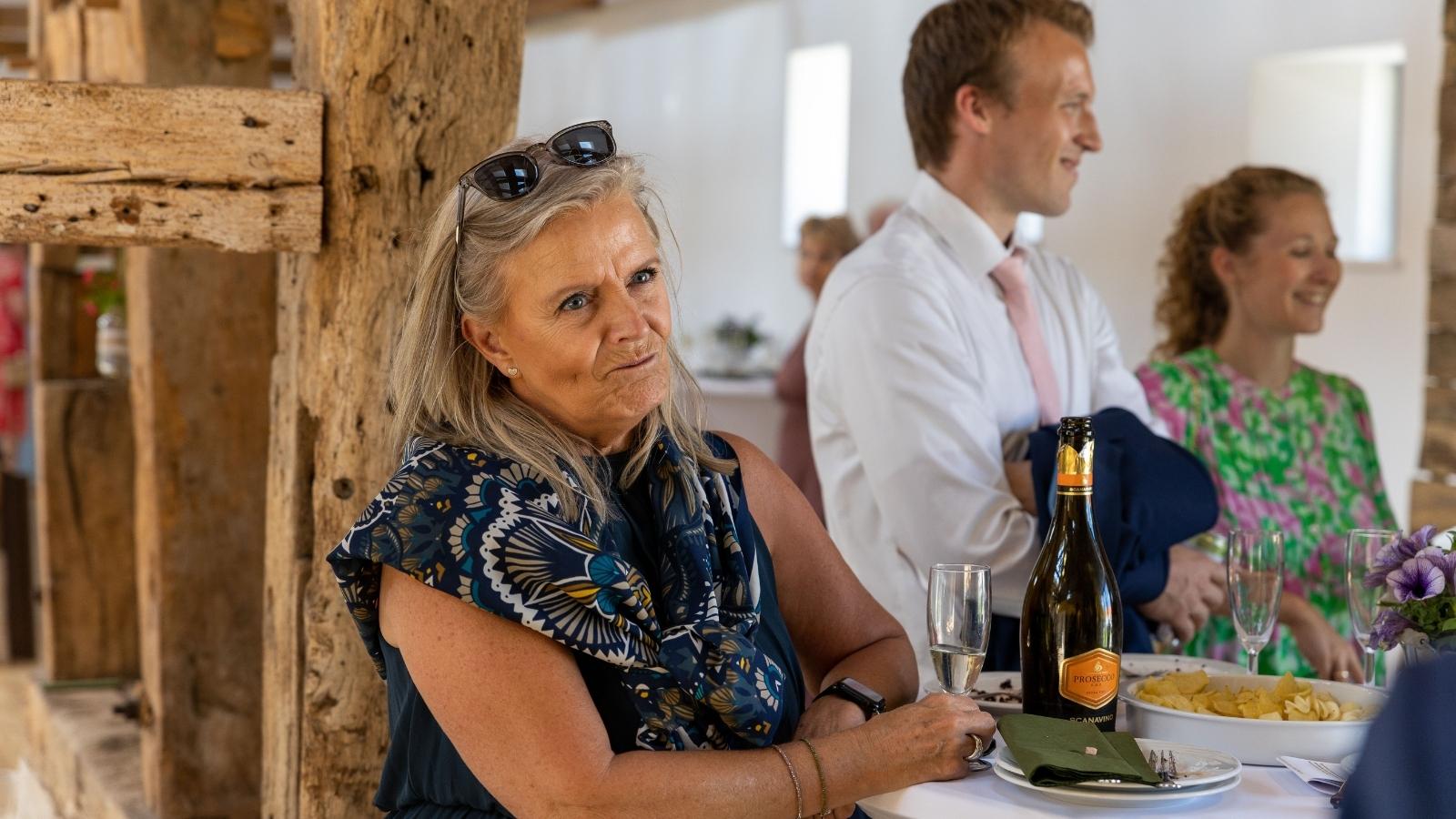 older woman attending a wedding