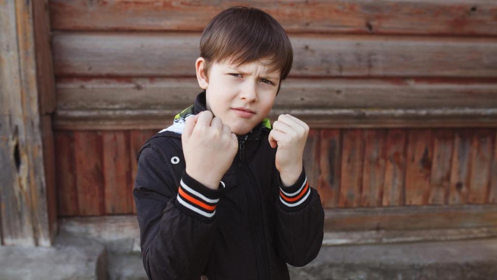 boy holding up his fists