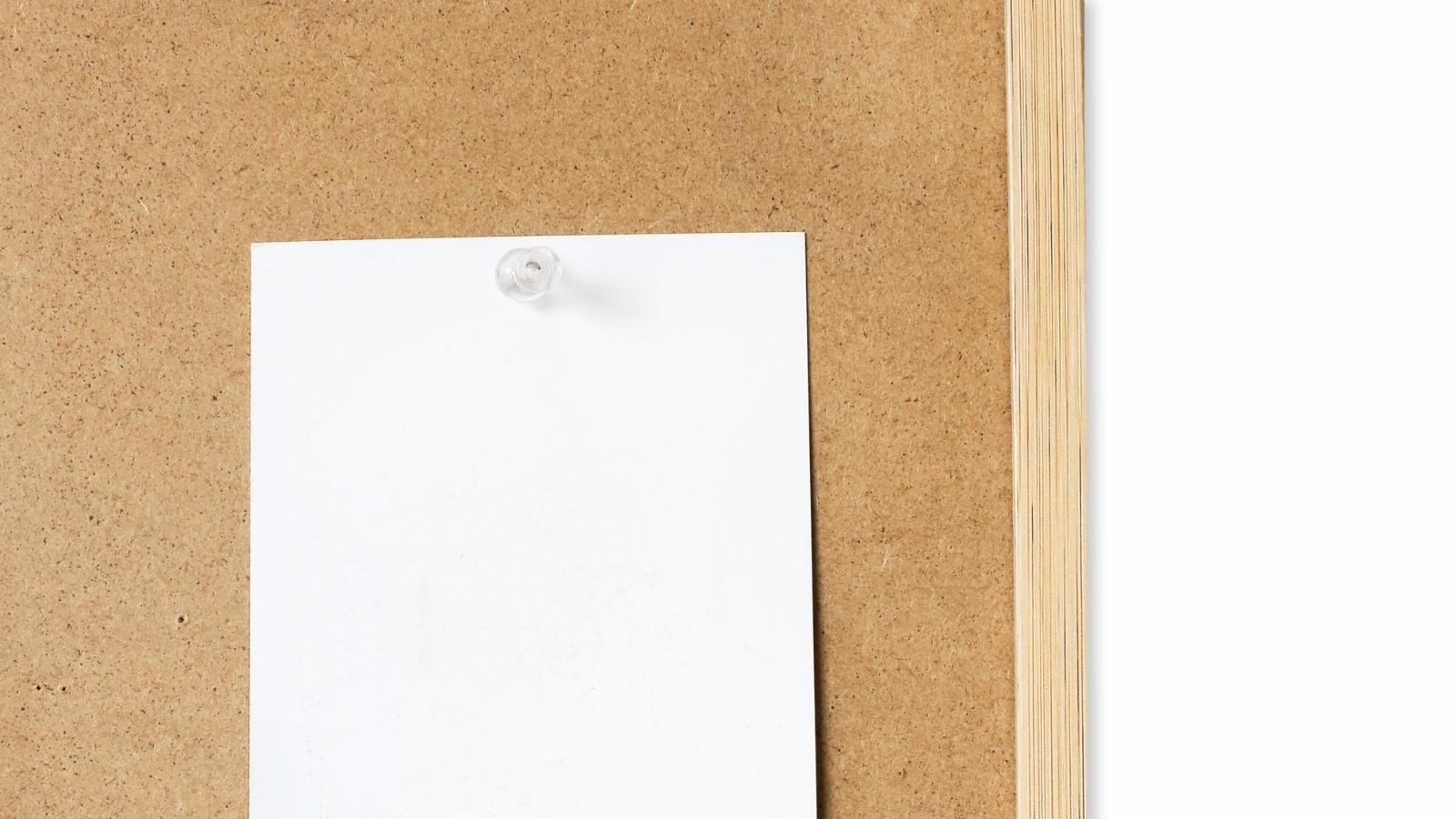 Woman Confronted Building Management Over A Made Up Laundry Rule So Her Roommate Confessed To Faking Notices For A Month paper tacked to a bulletin board