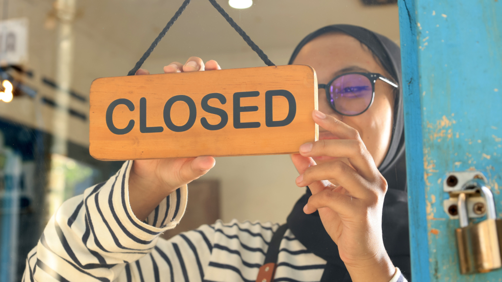 He Forced His Way Past the Closing Doors at 9:02 PM—Then Demanded a Personal Guided Tour of the Appliance Department person putting up closed sign