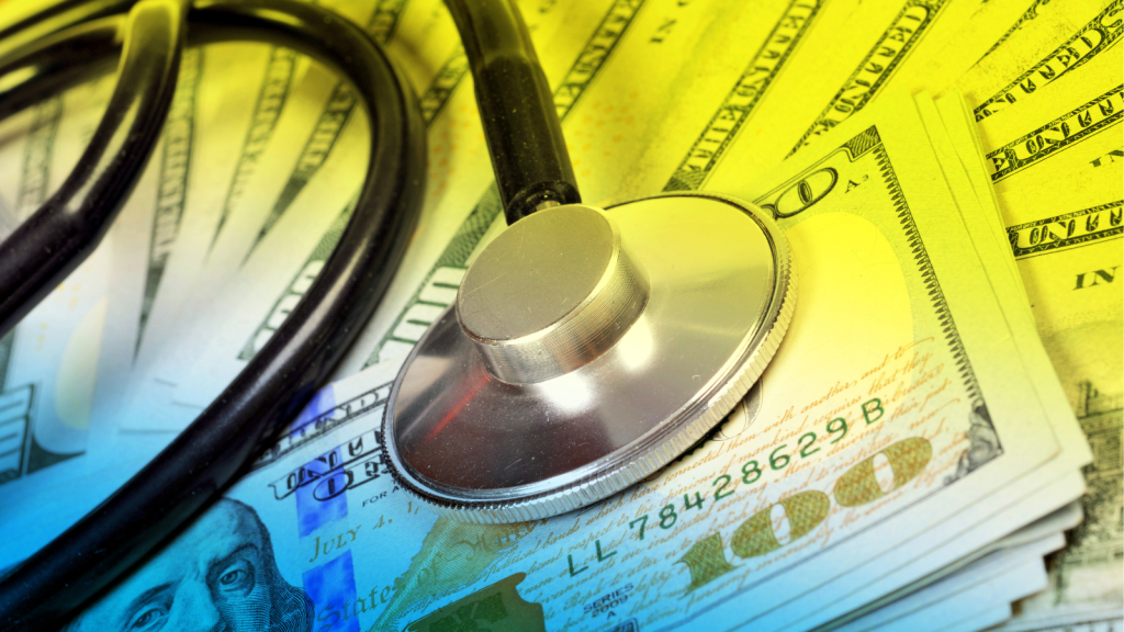 One Young Woman’s Growing Savings Suddenly Became A Source Of Conflict When Her Mom Asked To Borrow Everything She Had Set Aside pile of cash with stethoscope