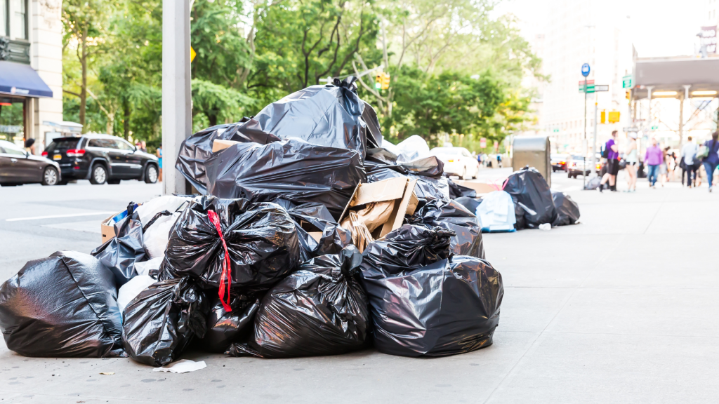 They Demanded an Immediate Stop to All Work Until Every Speck of Dust Is Gone—So the Crew Executed a Hyper Literal Safety Protocol that Halted the Renovation for Weeks pile of trash bags on the curb