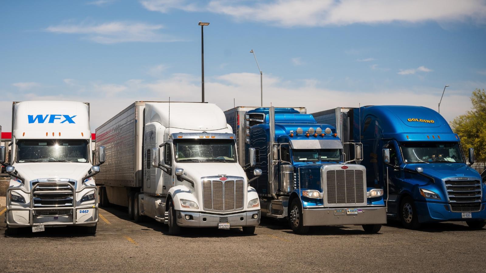 trucks parked at a truck stop