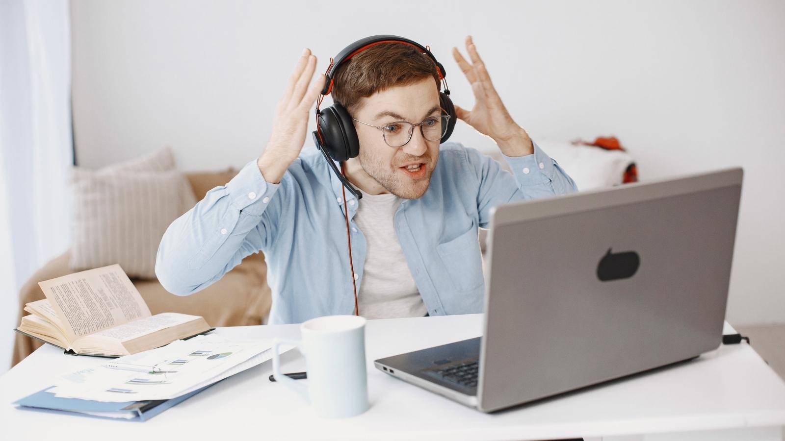 A Company Replaced Working Systems With Disconnected Software In Just A Few Months, And Frustrated Employees Started Walking Out stressed employee yelling at his computer