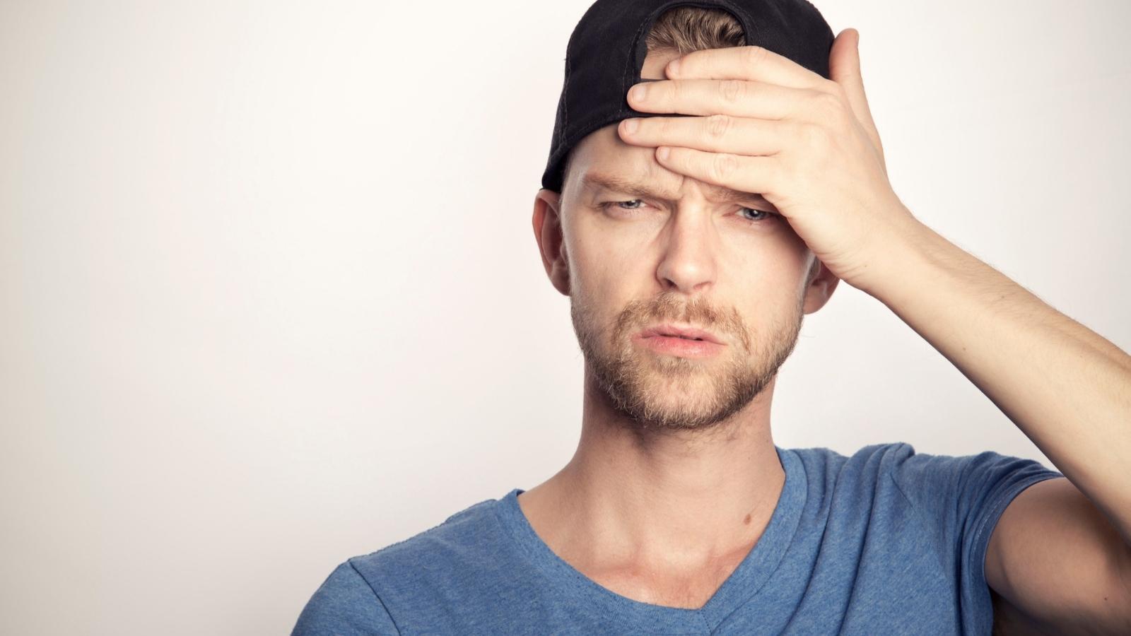 Firefighter Set One Simple Car Rule To Stay Ready For Emergency Calls, But His Entitled Sibling Ignored It Anyway stressed man in ball cap face palming