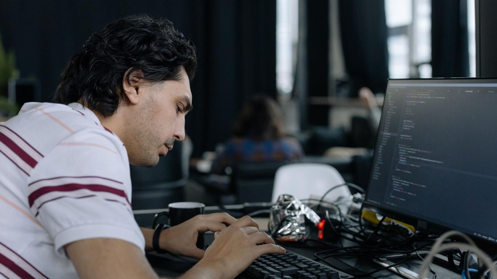 A Company Kept A Former Employees Account Active For Months After He Left, So His Old Coworkers Got Stuck Covering His Entire Workload stressed man working on his computer