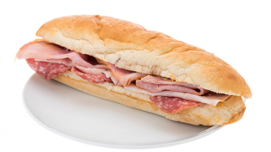 A Father Made His Son Skip Lunch As Punishment For A C In Science — While His Brother Mocked Him For It sub sandwich on a plate