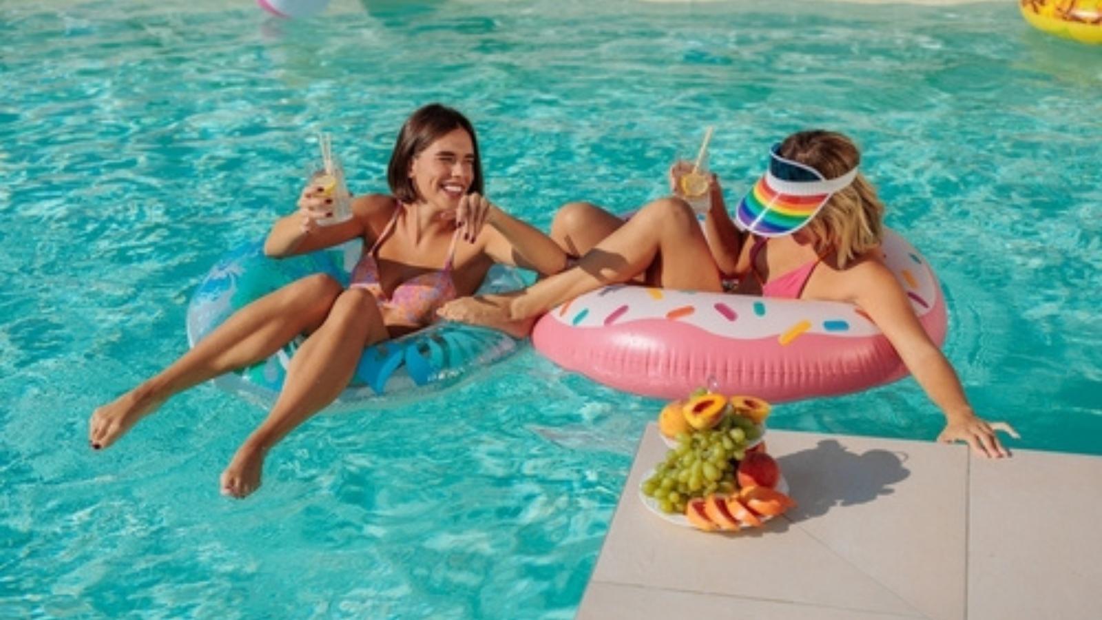 While She And A Friend Were Goofing Around In A Pool, Her Friend Lost An Expensive Earring, And When She Refused To Pay For It, Her Friend Blocked Her Women swimming