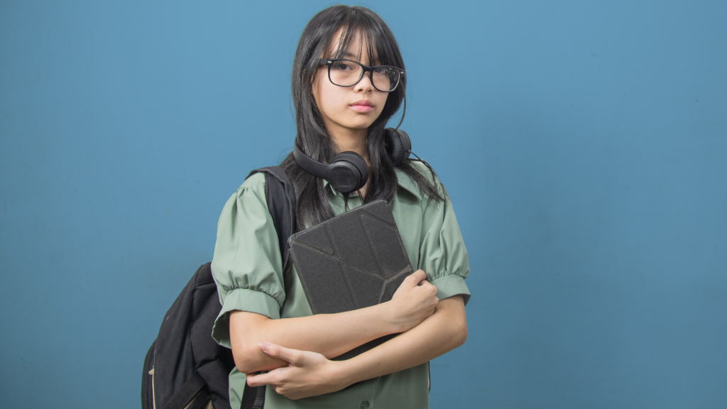 One Classmate Volunteered Her For A School Activity Without Asking, But She Made It Clear She Wouldn’t Participate In Something She Never Chose teen school girl wearing headphones