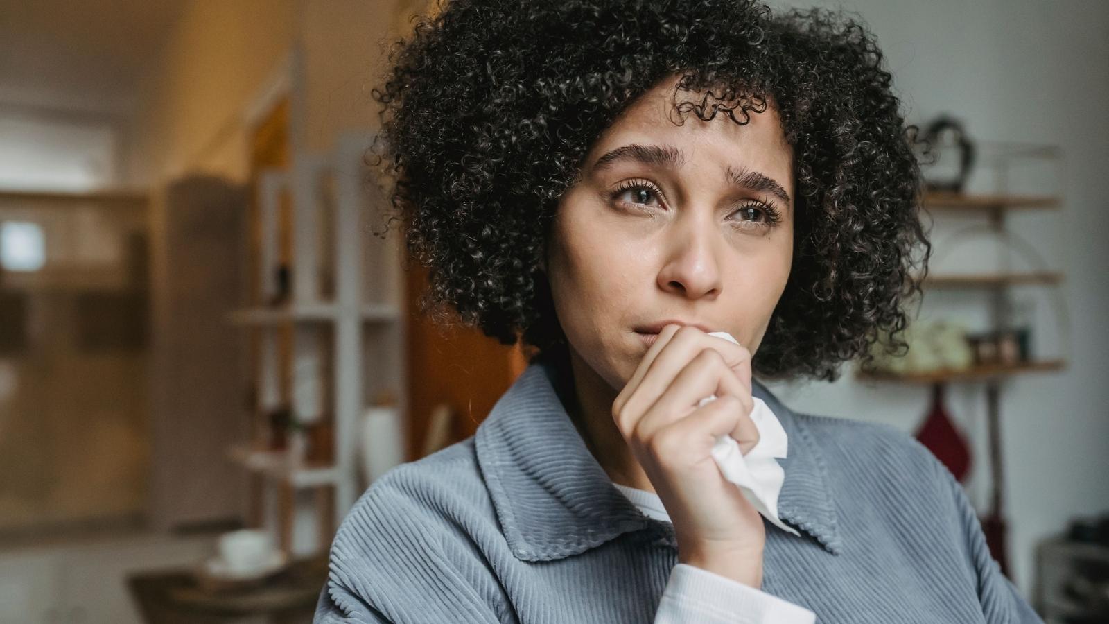 She Cut Off Two Lifelong Friends Who Criticized Her Every Move—Then Was Consumed by Guilt Over Abandoning the Past troubled woman looking out the window