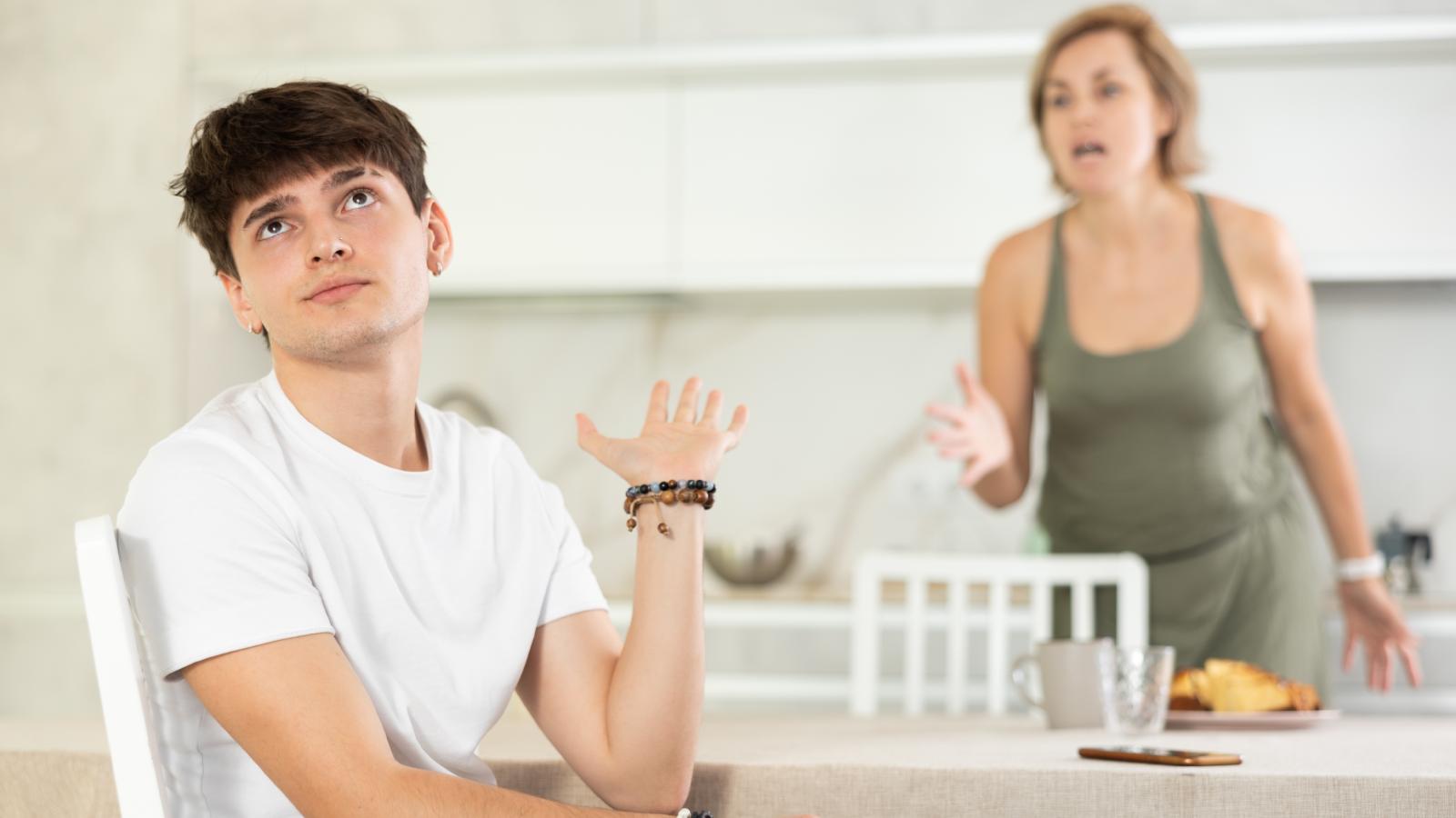 18 Year Old Inherits a Good Amount of Money—But His Controlling Mother Won’t Let Him Use It to Buy a Car young man arguing with his mother