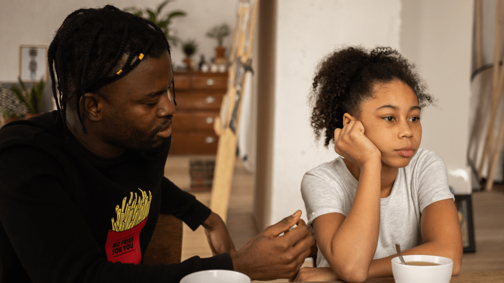 upset father with frustrated daughter