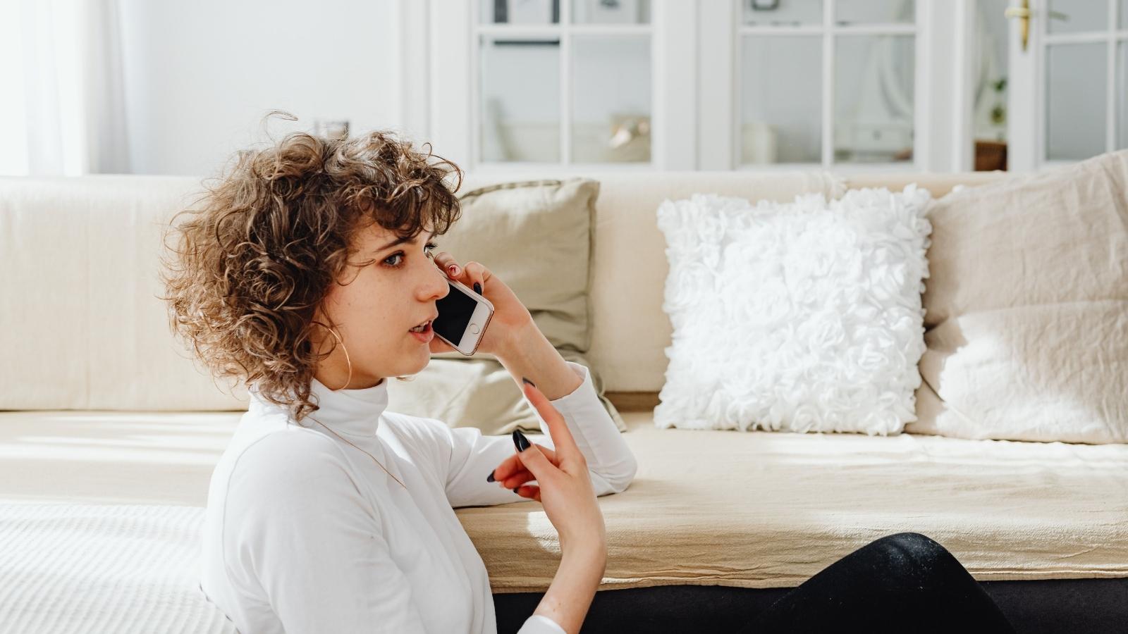 She Kept Her Milestone 30th Birthday Trip Paid Six Months in Advance—Then Exposed Her Friend’s Demand to Cancel for a Third Tier Wedding Event upset woman talking on her smartphone