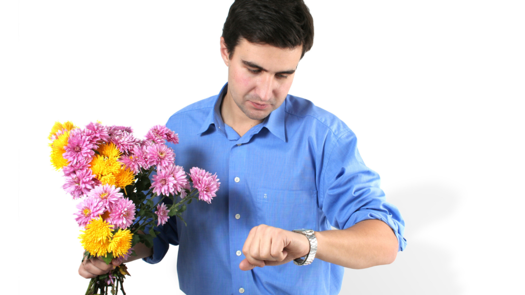 Mom Was Hurt by How Little Effort Her Husband Made on Mother’s Day—Then She Brushed Off His Last Minute Flowers waiting man looking at watch buying flowers