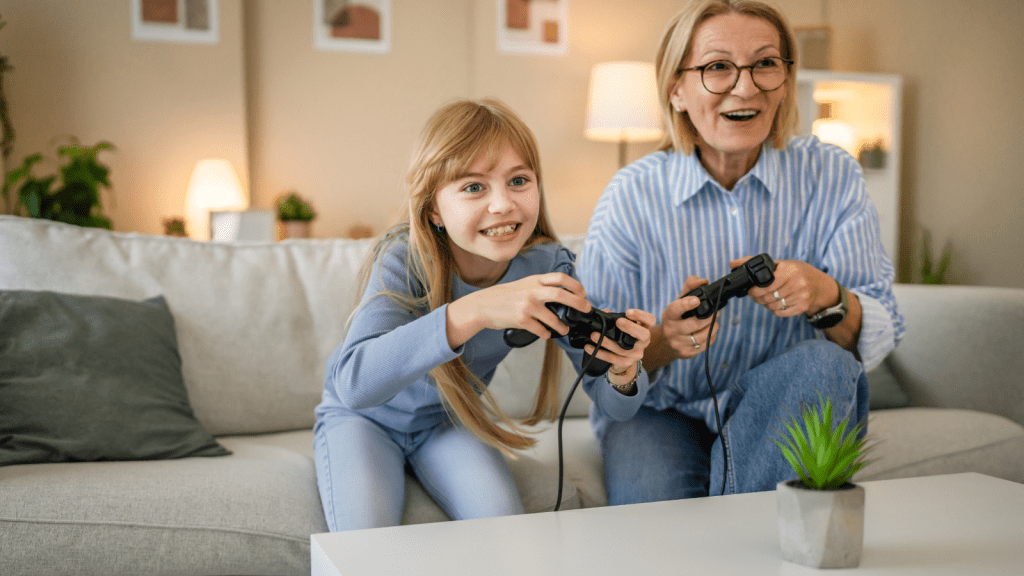 wholesome grandma with granddaughter video game