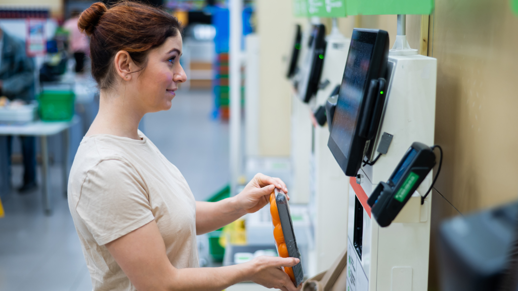 One Shopper Turned A Simple Self Checkout Into A Frustrating Ordeal, Then Found Herself Ignored When She Eventually Needed Employee Assistance woman at self-checkout at grocery store