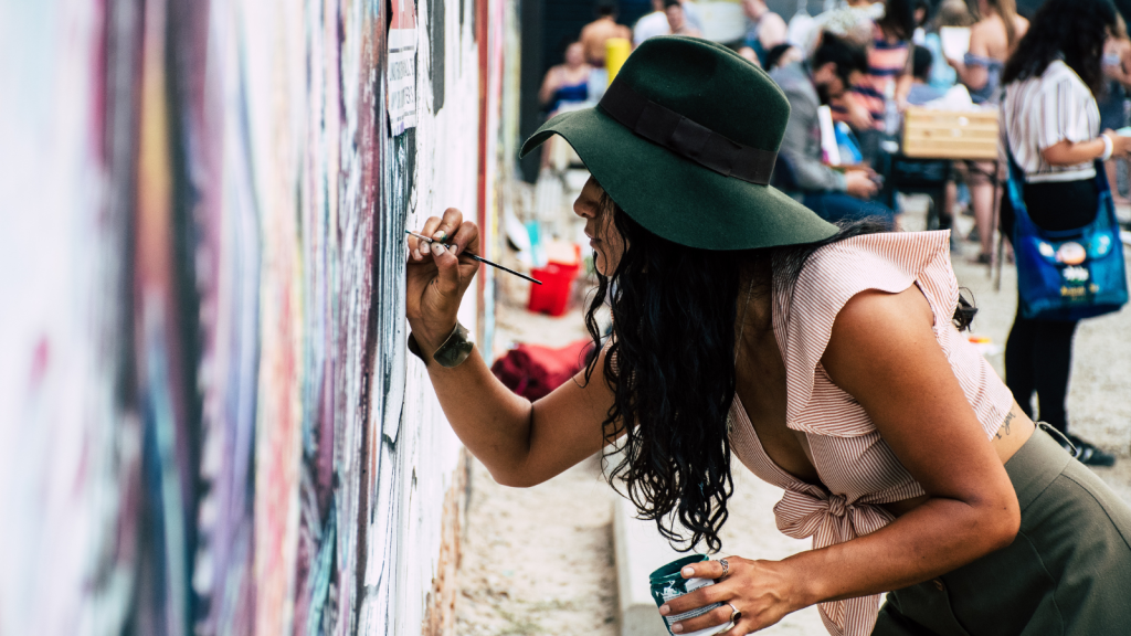 woman painting Mural wall art
