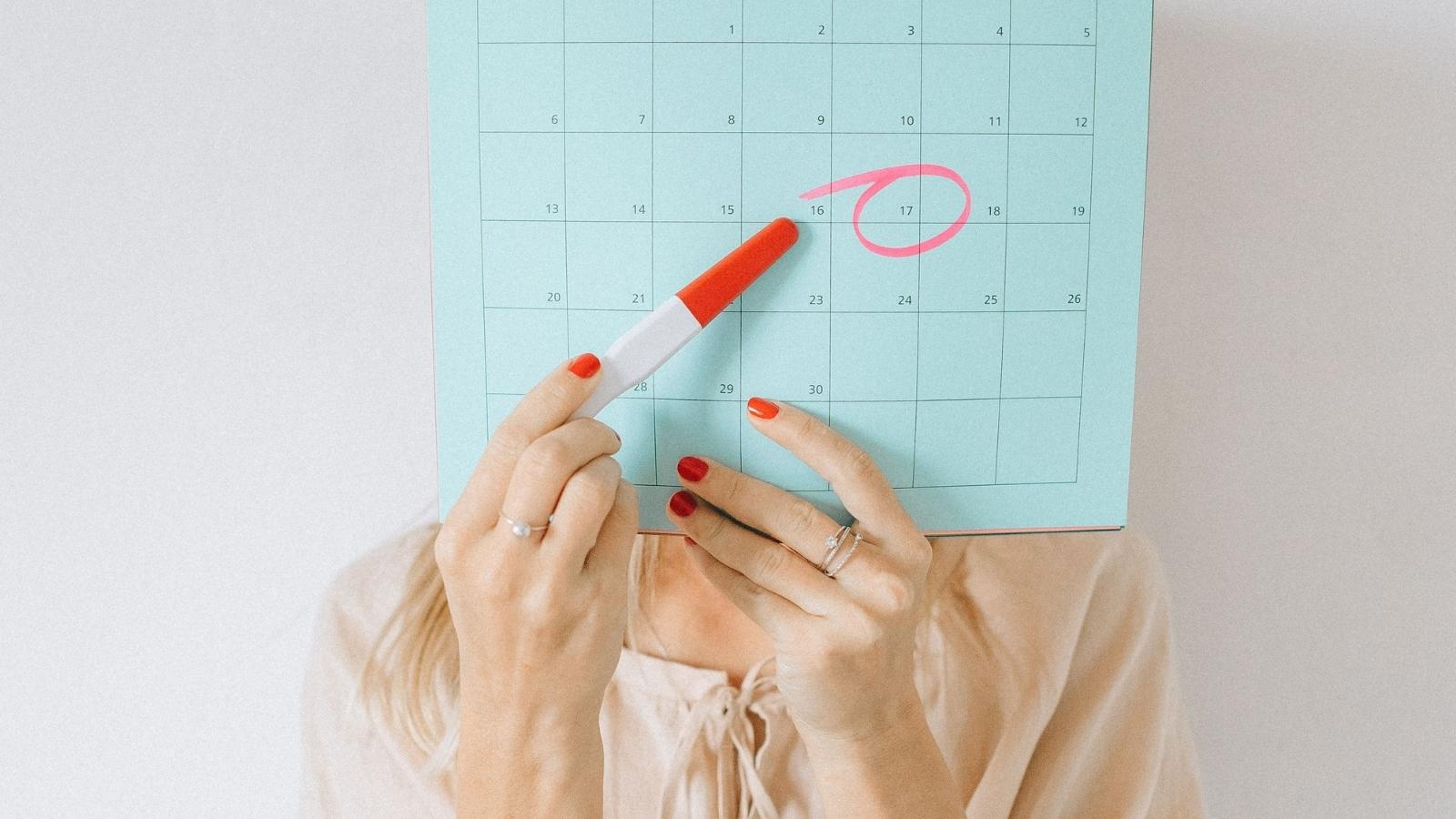 She Submitted Her Thanksgiving PTO Eight Months in Advance—Then Stood Firm When Her Team Demanded She Yield Her Holiday to a Senior Coworkers Birthday woman pointing to circled day on the calendar