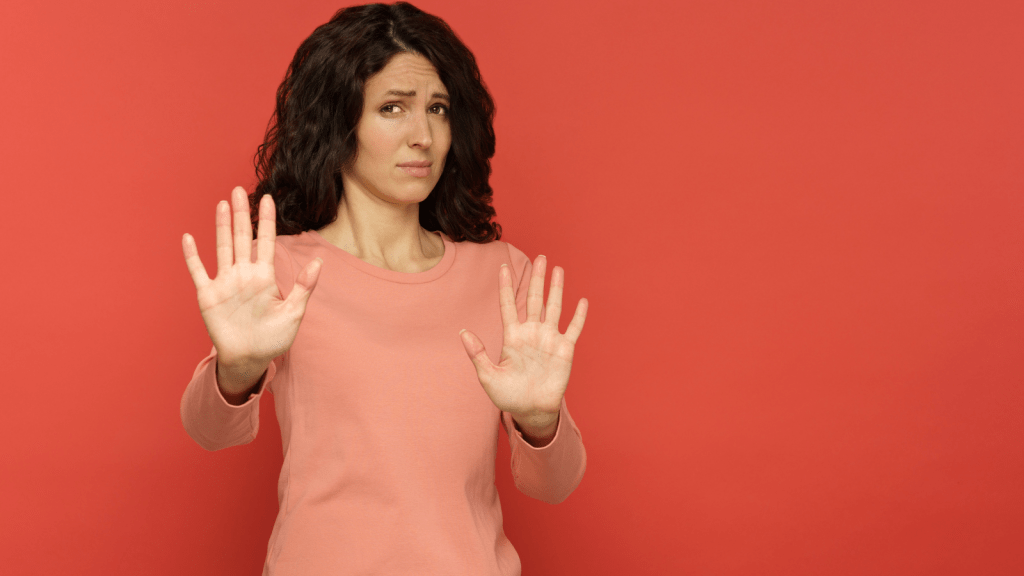 woman refusing with hands up