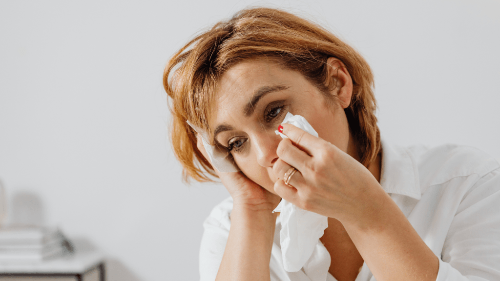 They Finally Spoke Up After The Customer Lashed Out Over The Delay, Yet The Emotional Reaction Made The Cashier Wish They Had Stayed Quiet woman sad wiping tears from eyes
