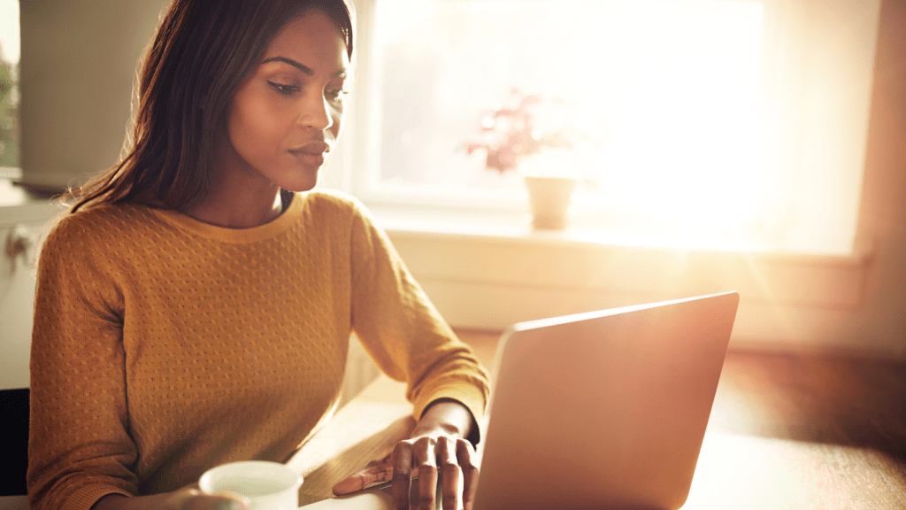 Bride To Be Refuses To Financially Rescue Her Fiancé’s Entire Family, But Setting That Boundary Has Everyone Accusing Her Of Being Heartless woman typing on computer at home