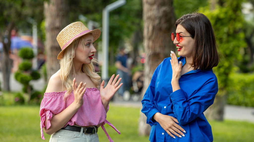 He Was At The Park With His Younger Brother When He Noticed A Group Of Women Talking About Them women at park gossiping
