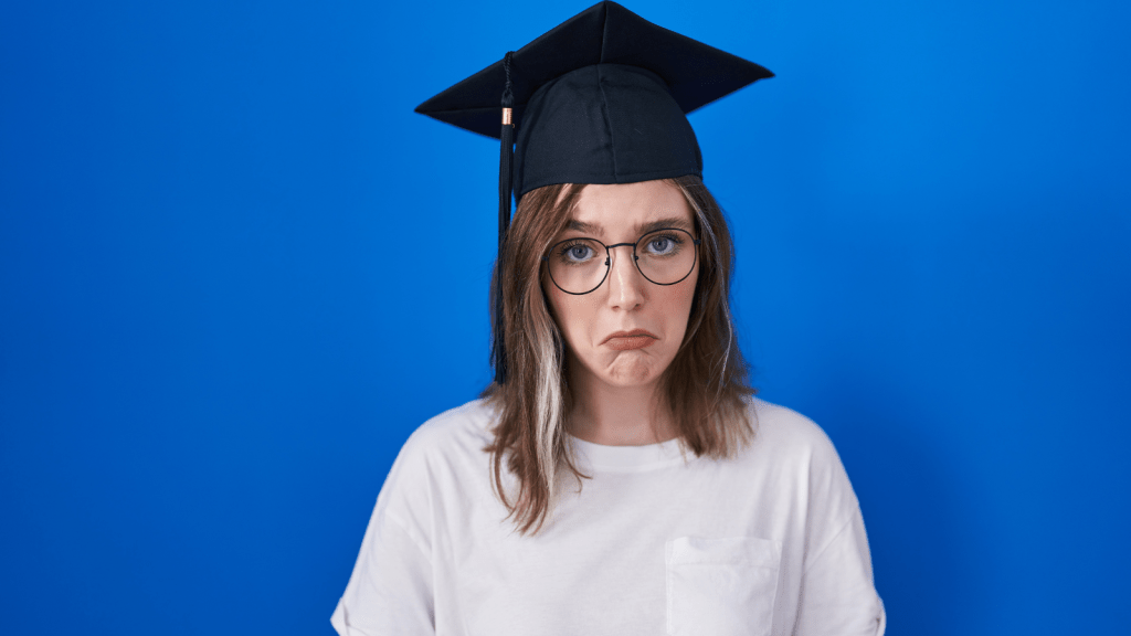 Her Birthday and Her Friends Graduation Landed on the Same Day. Shes Being Told to Give Up Hers young woman sad wearing graduation cap