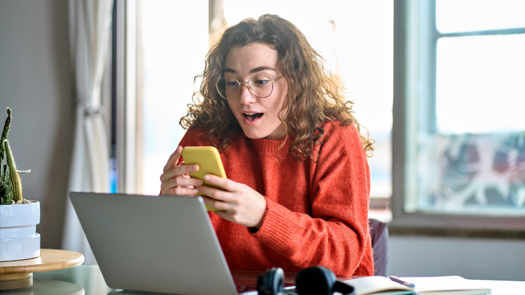 A College Bound Teen Is Preparing for Her Big Move—Until Her Sister’s Obsessive, Overbearing Control Turns the Process Creepy young woman shocked looking at phone