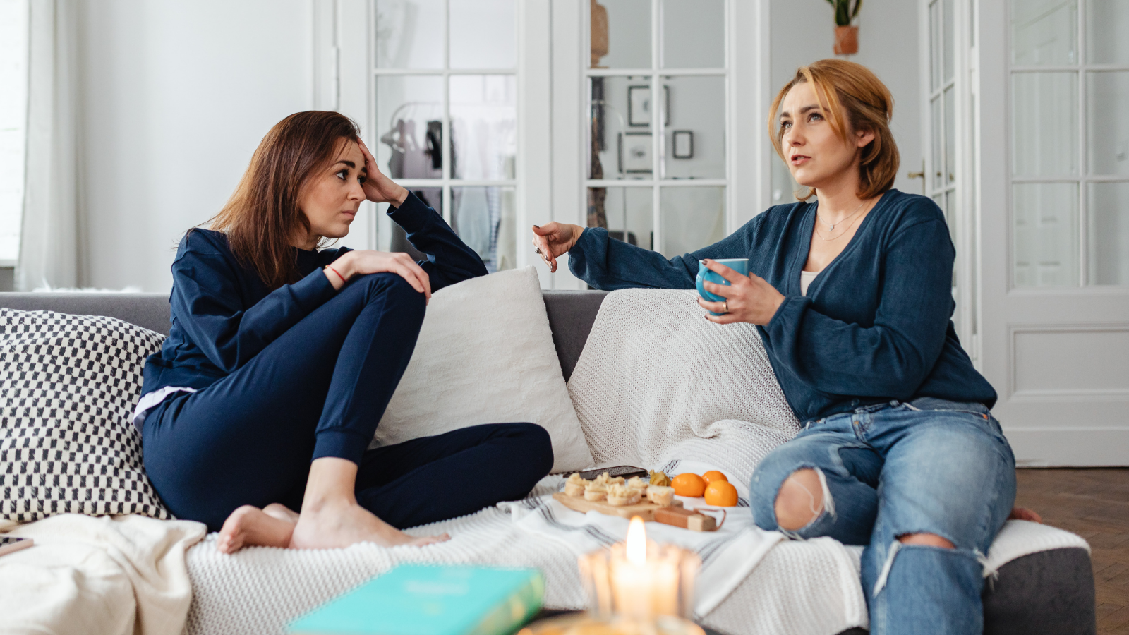They Shared an Apartment, Desk, and Social Circle—Until Mutual Enmeshment Sparked Total Burnout Two women talking on the couch