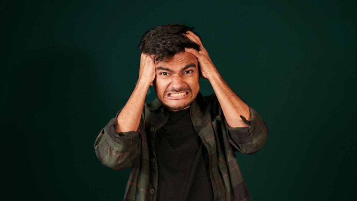 young man with an expressive facial gesture
