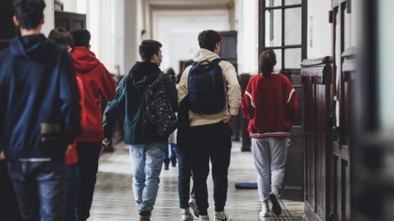 New Administrators Made Students Walk In Lanes To Stop Tardiness, But The Kids Followed The Rule So Literally That Everyone Got Later Students in the hallway