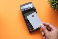 Customer Tries To Feed Cash Into A Card Reader, And The Cashier Can Barely Keep A Straight Face